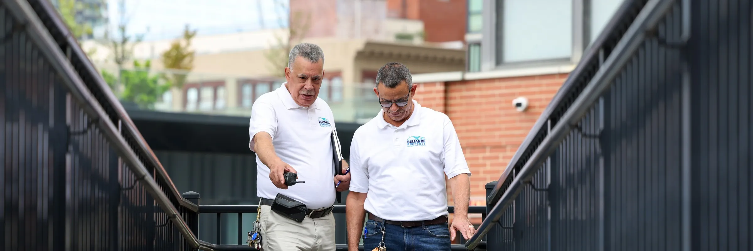 Two RPMG staff carrying out a site inspection at a New Jersey community