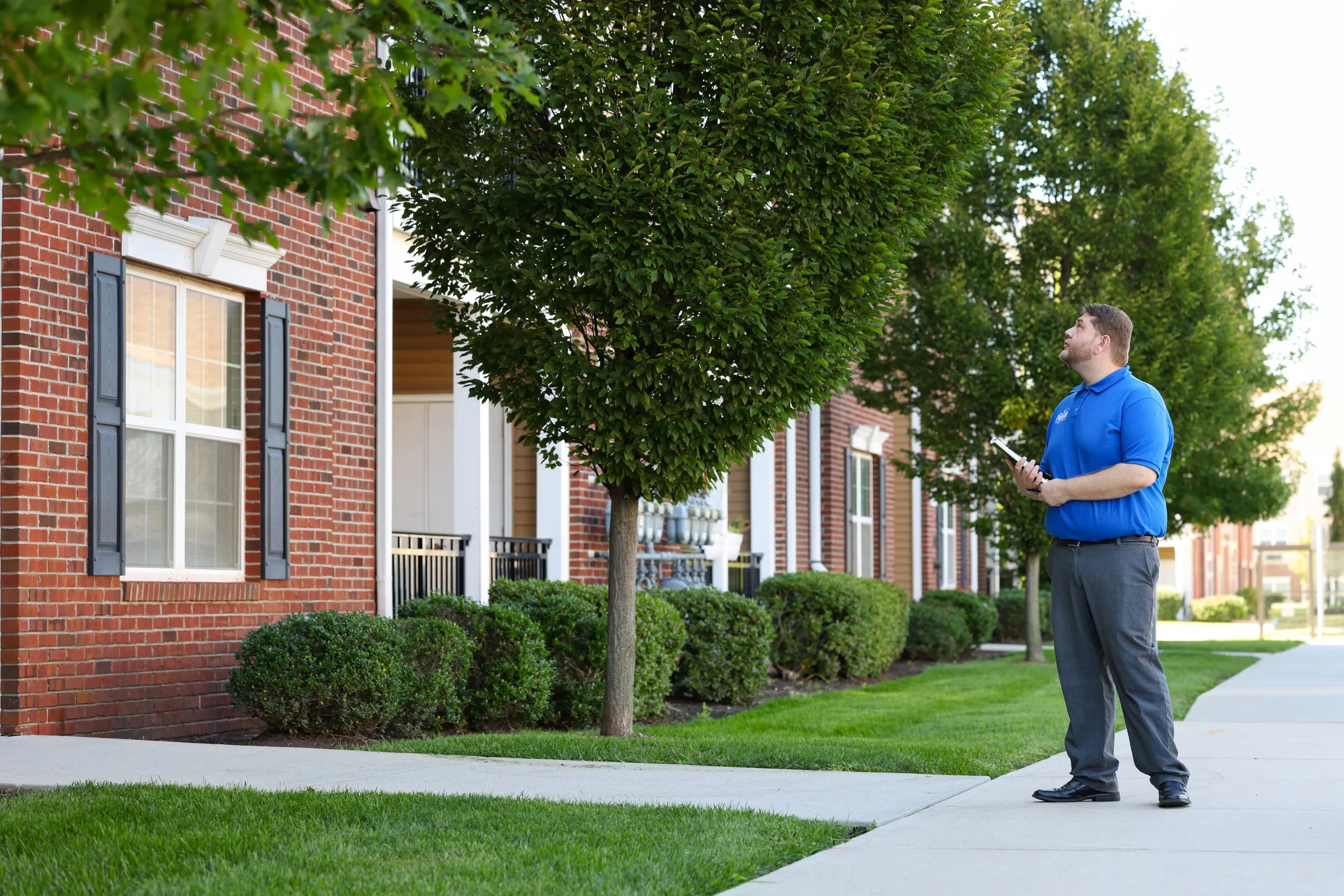 An RPMG property manager inspecting a New Jersey townhome community